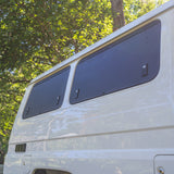 closed gullwing windows front and rear from low angle of troopy