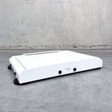 Starlink Mini Mount - White on concrete background