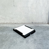 black starlink mounting bracket with white cover and anderson