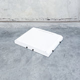 top view of white starlink mini mount with white cover for rola titan and front runner roof racks