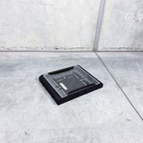 top view of shock absorber through clear cover of a starlink mount