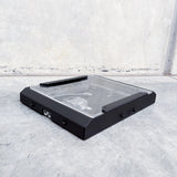 anderson plug view of starlink mini roof rack mounting bracket with step up booster and clear cover