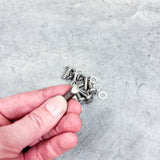 hand holding security bolts for starlink mini mount