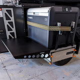 side view of patriot camper side table next to dometic fridge