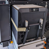 strap closed over the patriot camper side table.