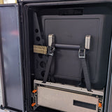 fridge drawer closed with stowed patriot camper side table.